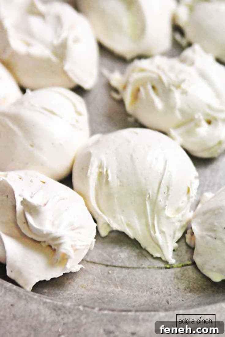 Photograph of white divinity candy on a silver plate.