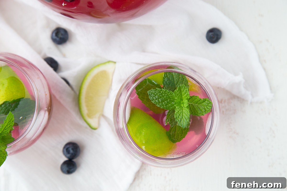 blueberry mojito with mint in a small glass