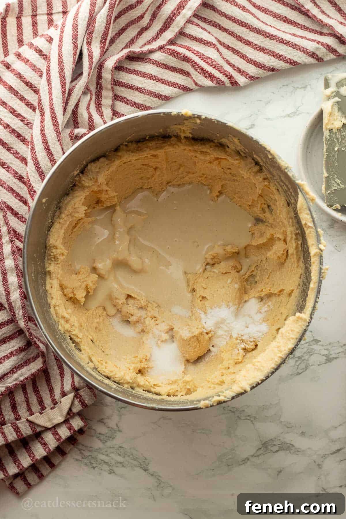 Sourdough discard and salt in mixing bowl with butter and sugar.