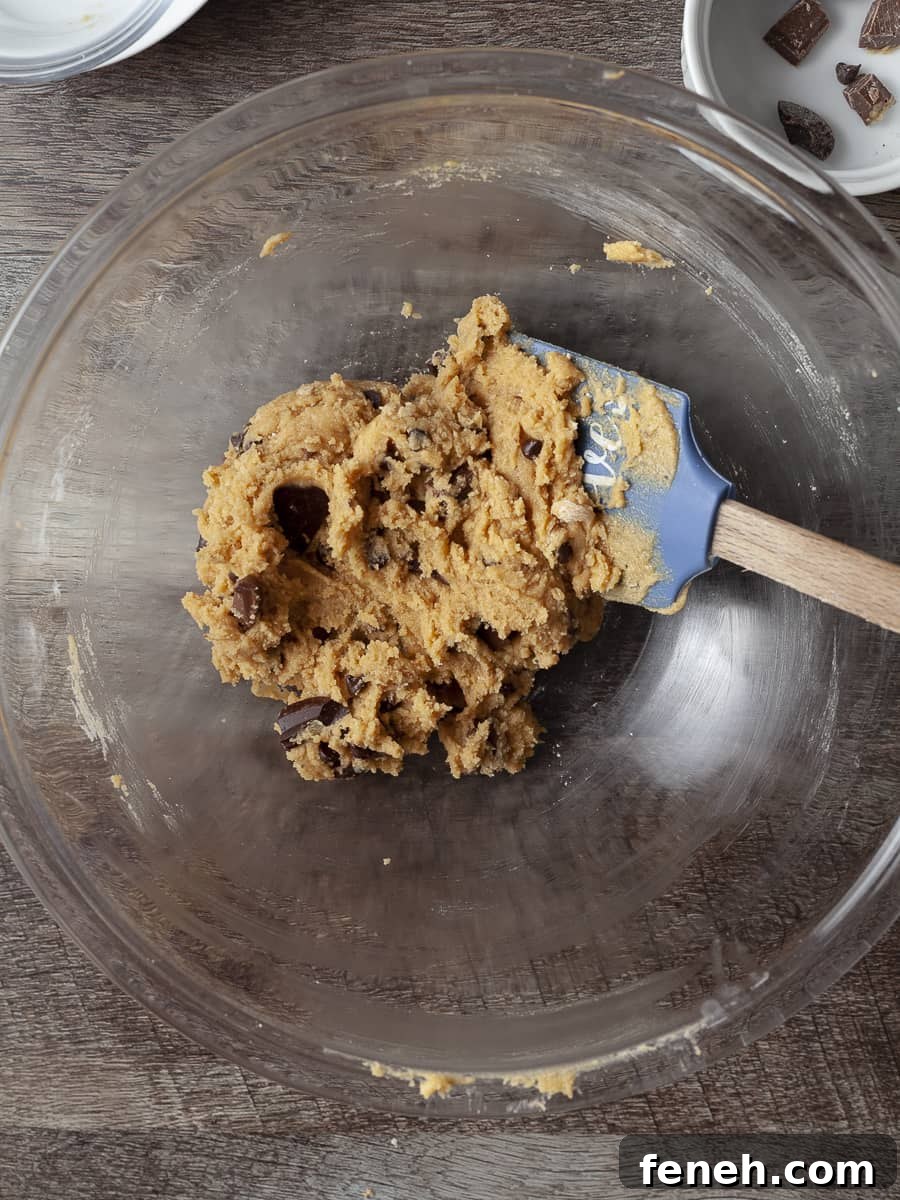 dough for peanut butter chocolate chip cookies in a bowl