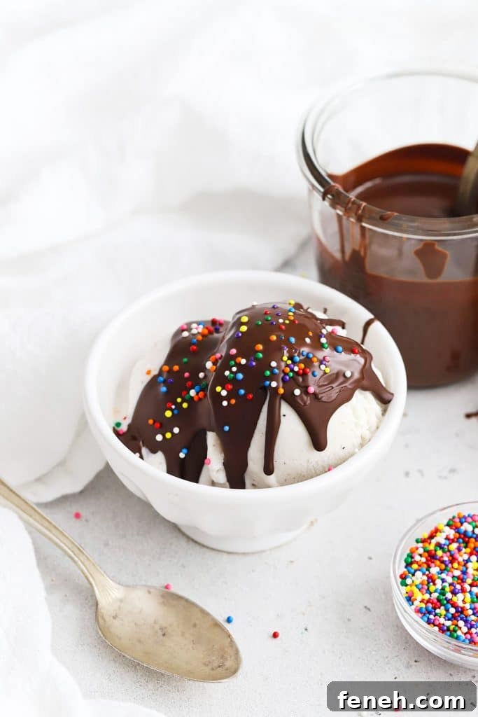 Homemade magic chocolate shell hardening on vanilla ice cream